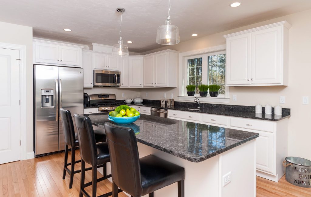 An open and modern kitchen is the perfect backdrop for family gatherings.